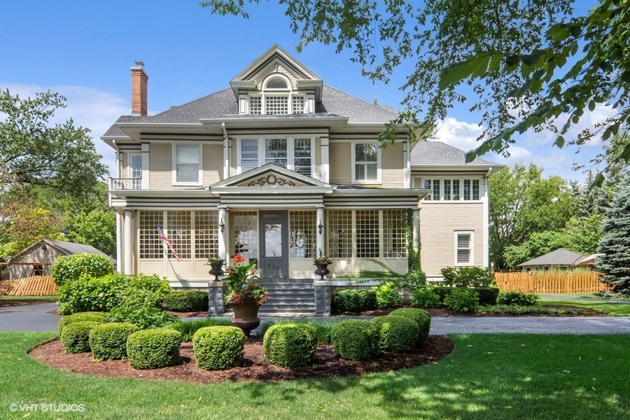 236 Melrose Avenue Elmhurst, IL 60126 - Photo 1 of 50 a front view of a house with garden