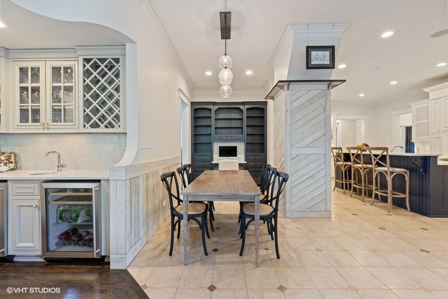 236 Melrose Avenue Elmhurst, IL 60126 - Photo 11 of 50 a view of a a dining room with furniture window and wooden floor