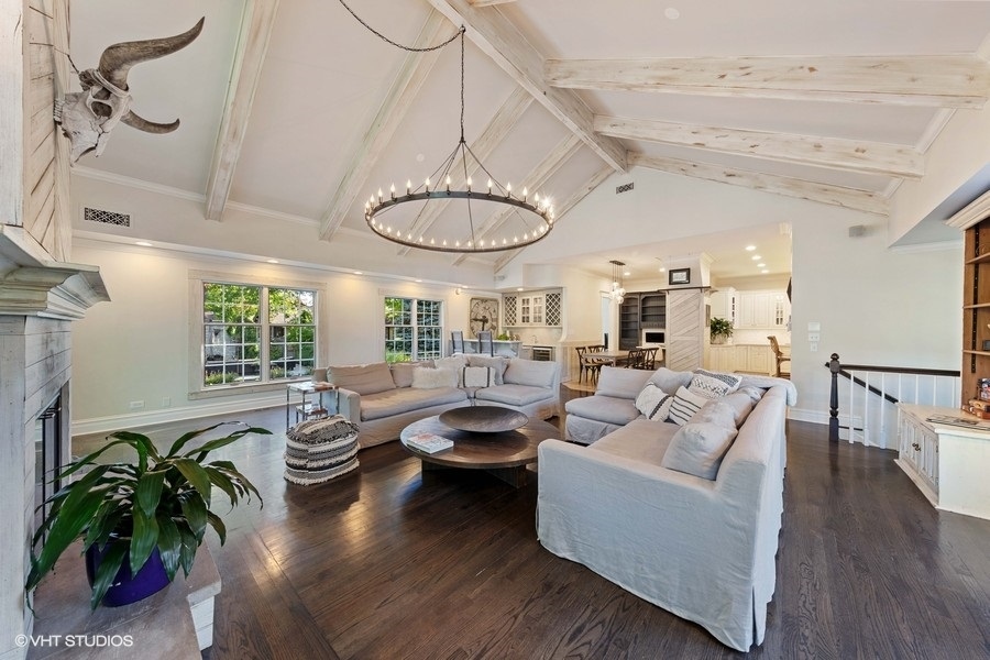 236 Melrose Avenue Elmhurst, IL 60126 - Photo 16 of 50 a living room with furniture potted plant and a chandelier