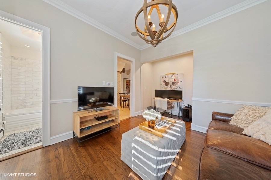 236 Melrose Avenue Elmhurst, IL 60126 - Photo 19 of 50 a living room with furniture and a flat screen tv