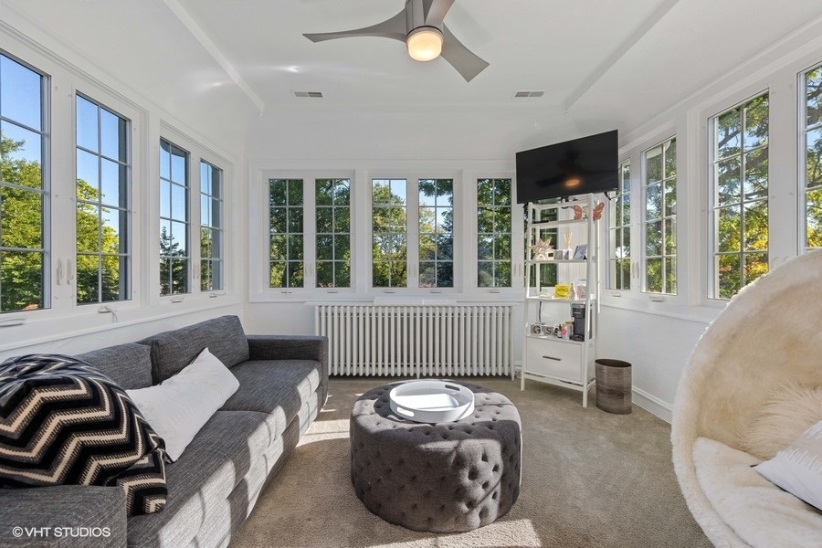 236 Melrose Avenue Elmhurst, IL 60126 - Photo 29 of 50 a living room with furniture and large windows