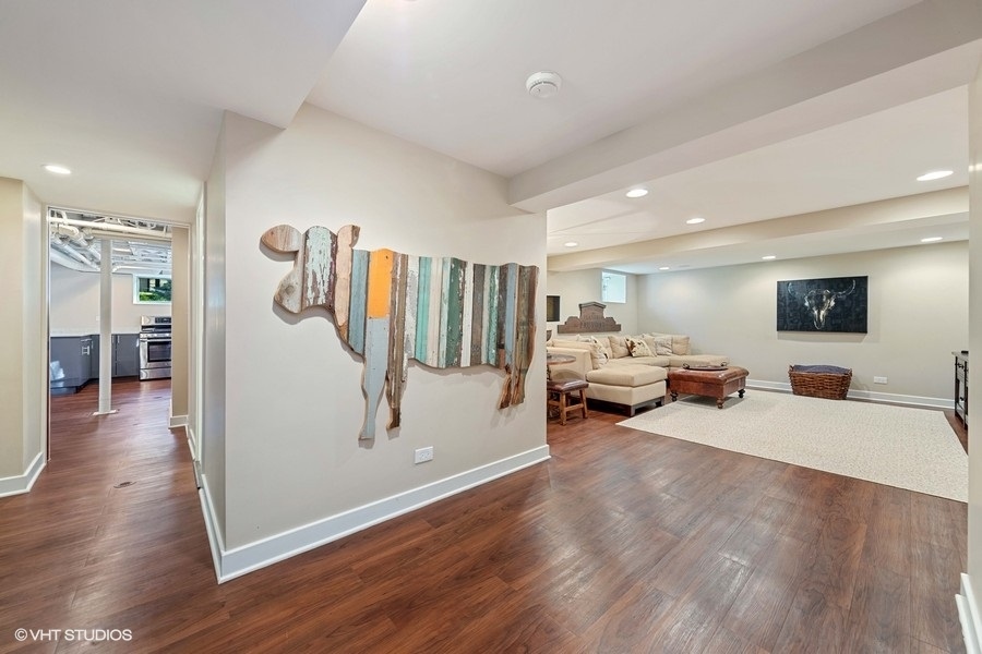 236 Melrose Avenue Elmhurst, IL 60126 - Photo 30 of 50 a living room with furniture and a wooden floor