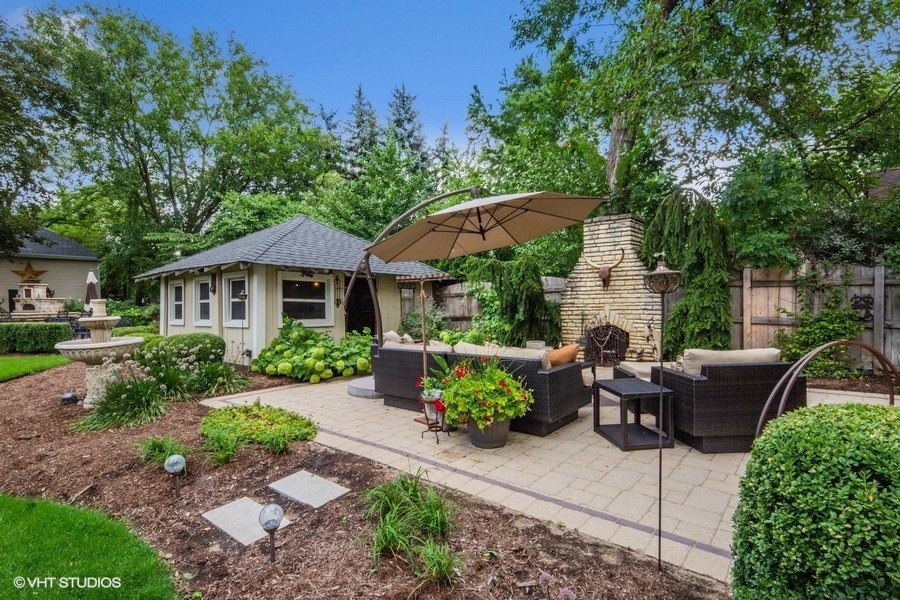 236 Melrose Avenue Elmhurst, IL 60126 - Photo 43 of 50 a view of a house with backyard sitting area and garden