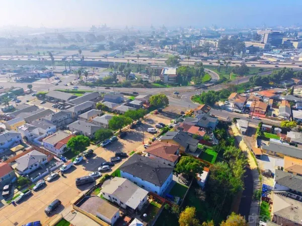 an aerial view of a city with lots of residential buildings