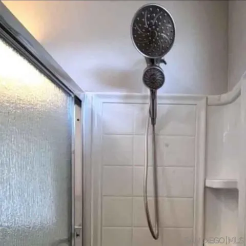 a view of a hallway with a chandelier