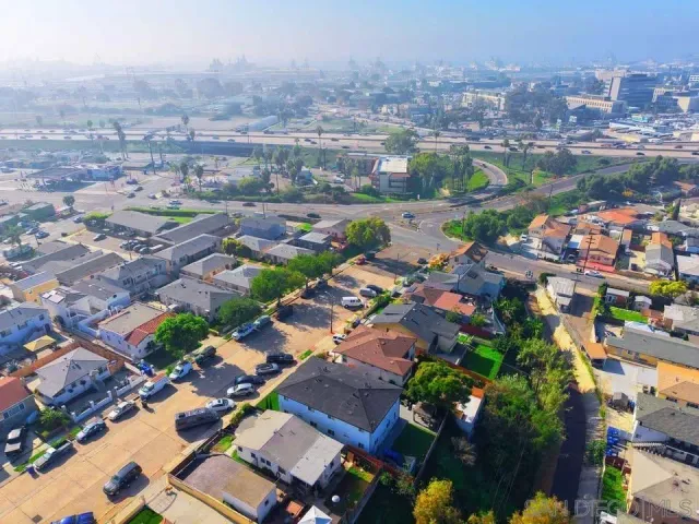 an aerial view of a city with lots of residential buildings