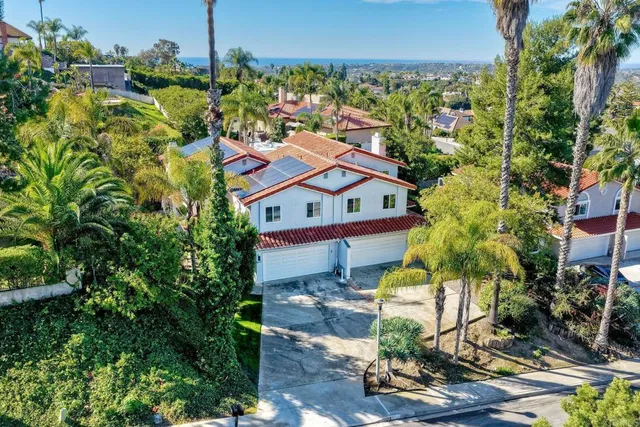 a house with trees in the background