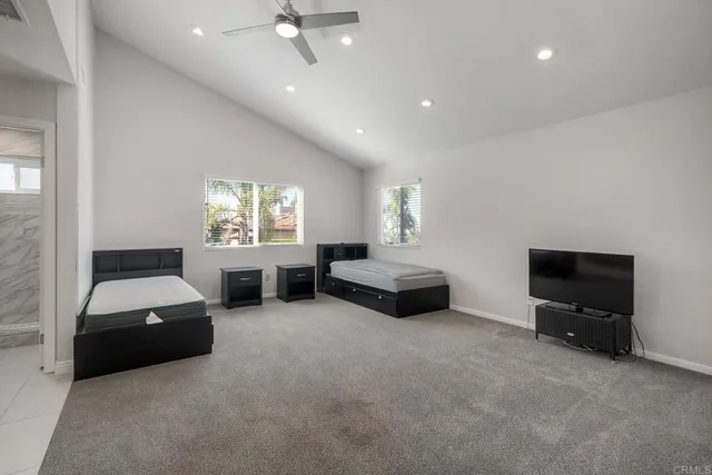 a room with a bed and a window