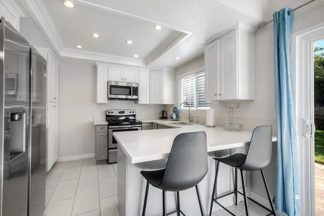 a bathroom with a shower and a mirror