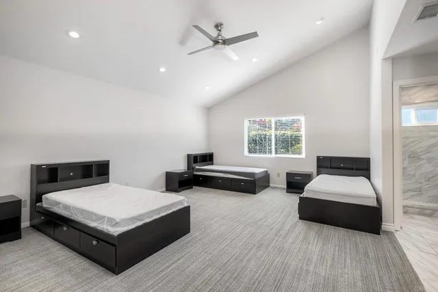 a bathroom with a glass shower door