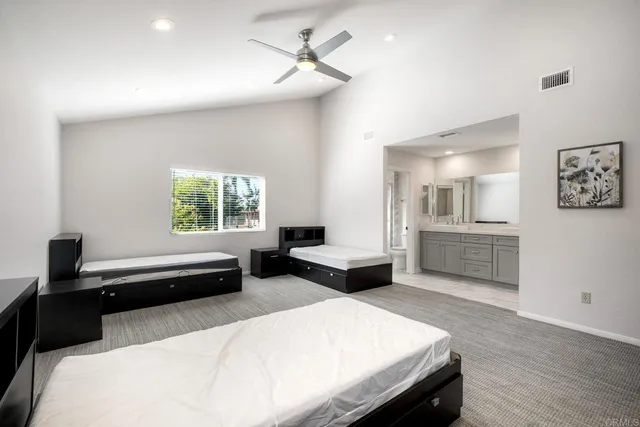 a view of backyard of house with outdoor seating and green space
