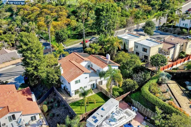 a view of a backyard with a garden