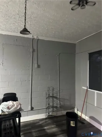 a dining room with a table and chairs