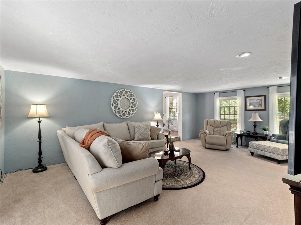 360 Dappenbrook Drive Beaver, PA 15009 - Photo 11 of 30 a living room with furniture a lamp and a large window