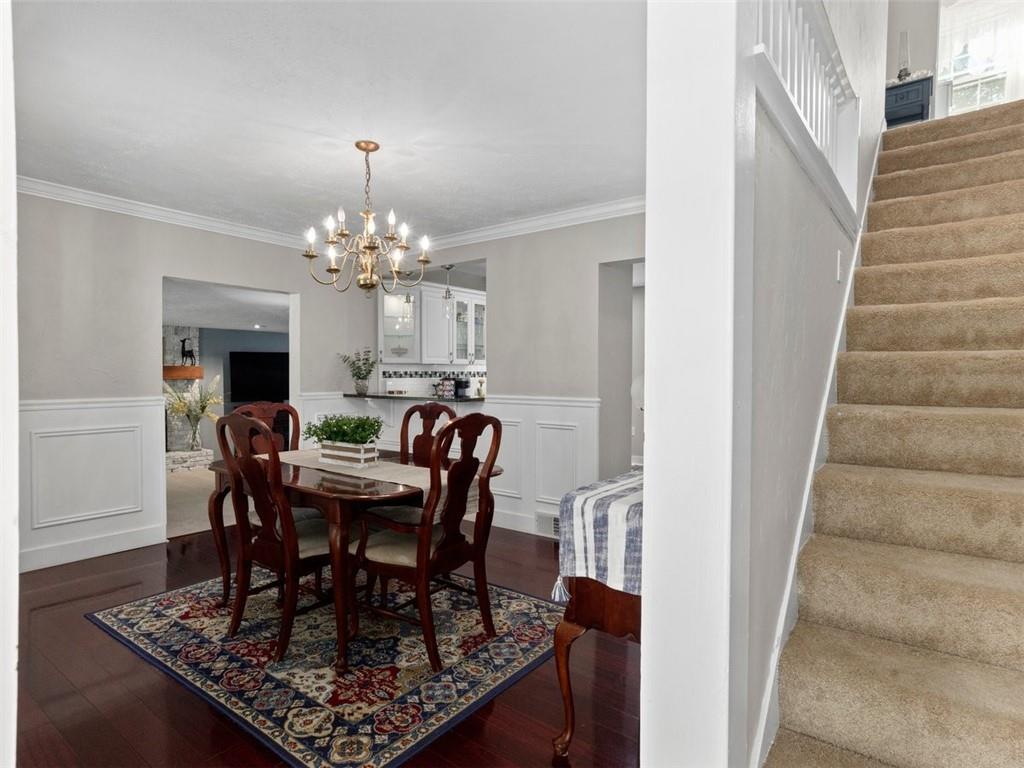 360 Dappenbrook Drive Beaver, PA 15009 - Photo 12 of 30 a dining room with furniture a rug and a chandelier