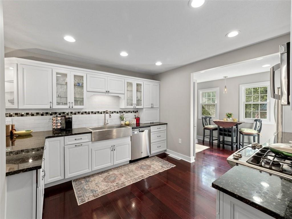 360 Dappenbrook Drive Beaver, PA 15009 - Photo 4 of 30 a kitchen with sink refrigerator and cabinets