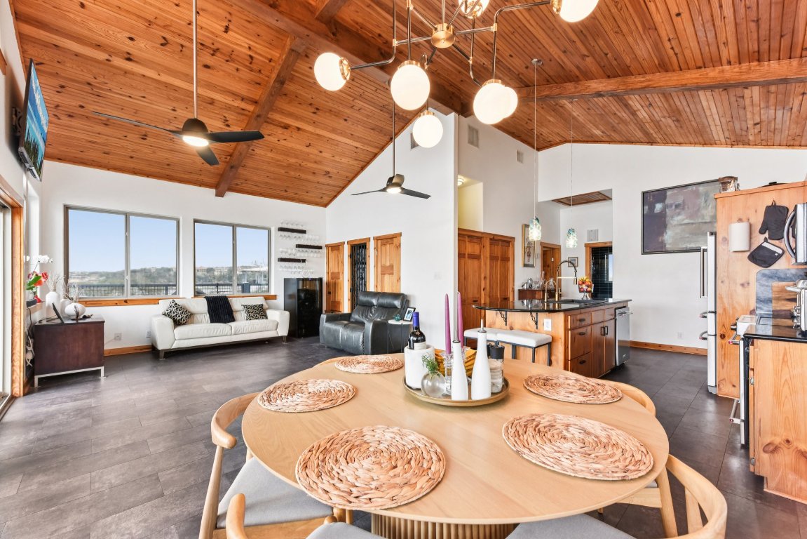 1813 Graveyard Point Road Austin, TX 78734 - Photo 13 of 40 a view of a dining room with furniture