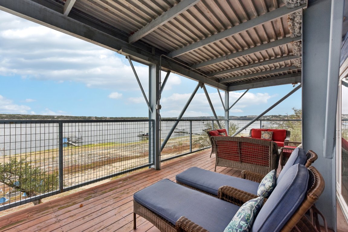 1813 Graveyard Point Road Austin, TX 78734 - Photo 18 of 40 a view of deck with wooden floor and outdoor seating