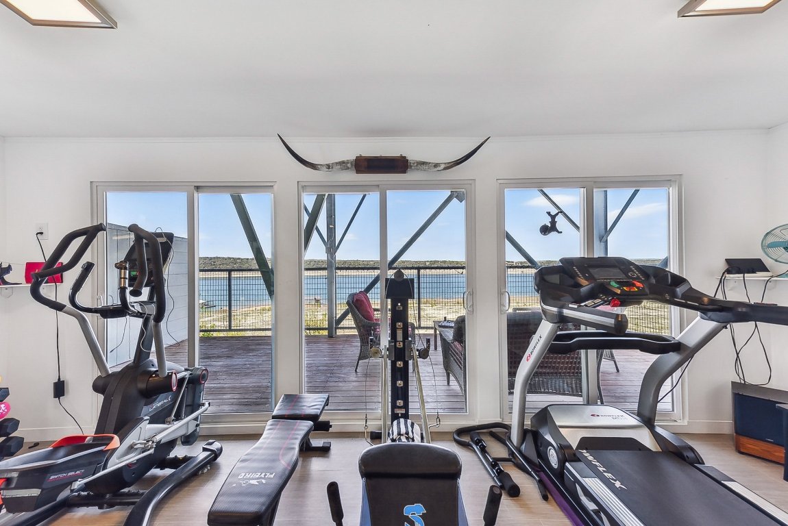 1813 Graveyard Point Road Austin, TX 78734 - Photo 29 of 40 a view of gym equipment and windows