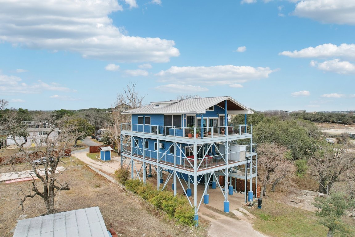 1813 Graveyard Point Road Austin, TX 78734 - Photo 4 of 40 a view of a house with roof deck