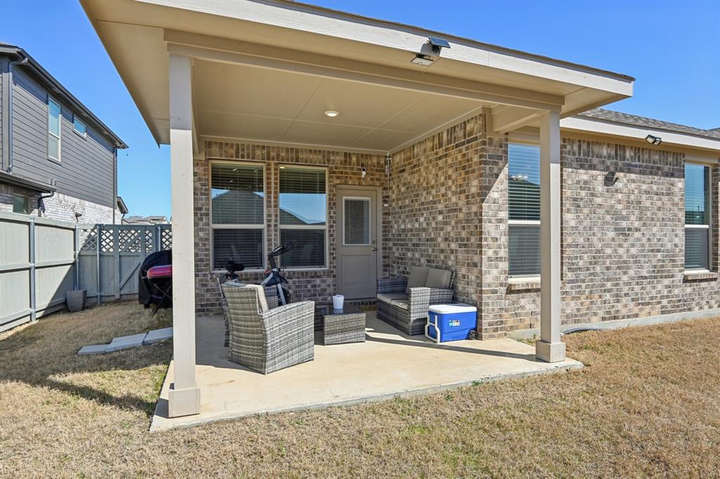 1504 Rachel Street Northlake, TX 76247 - Photo 35 of 40 a view of a patio with table and chairs