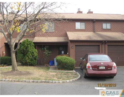 9 Marigold Court Edison, NJ 08820 - Photo 1 of 2 a view of a car parked in front of a building