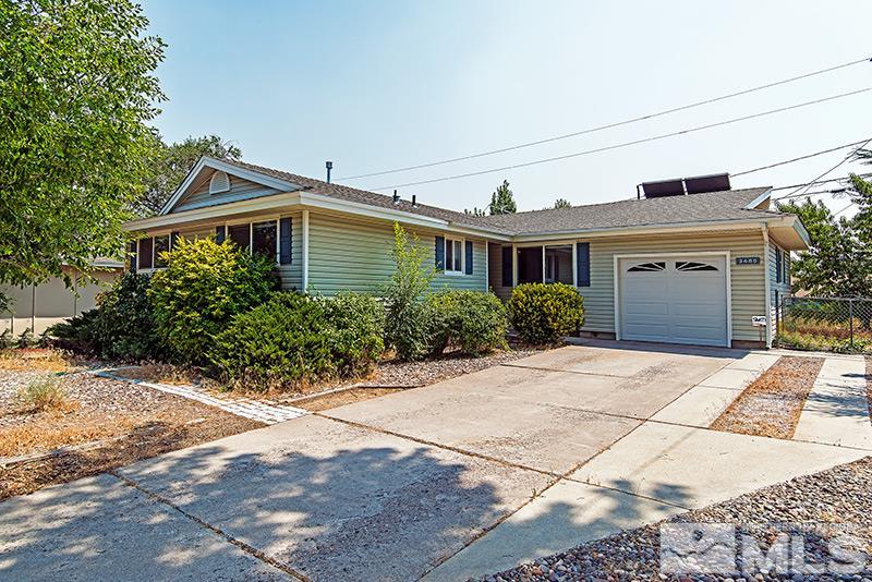 3480 Pierremont Road Reno, NV 89503 - Photo 1 of 16 a front view of a house with a yard
