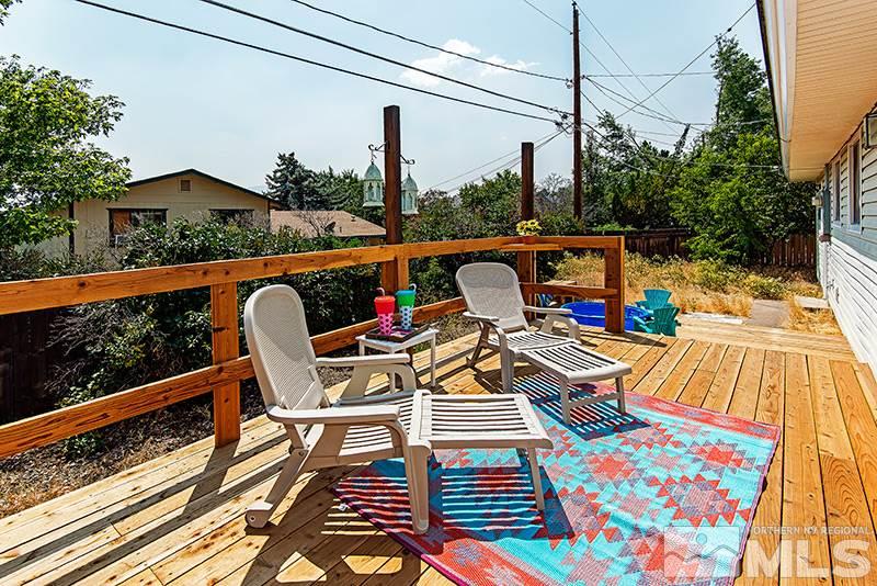 3480 Pierremont Road Reno, NV 89503 - Photo 14 of 16 a view of balcony with wooden floor and outdoor seating