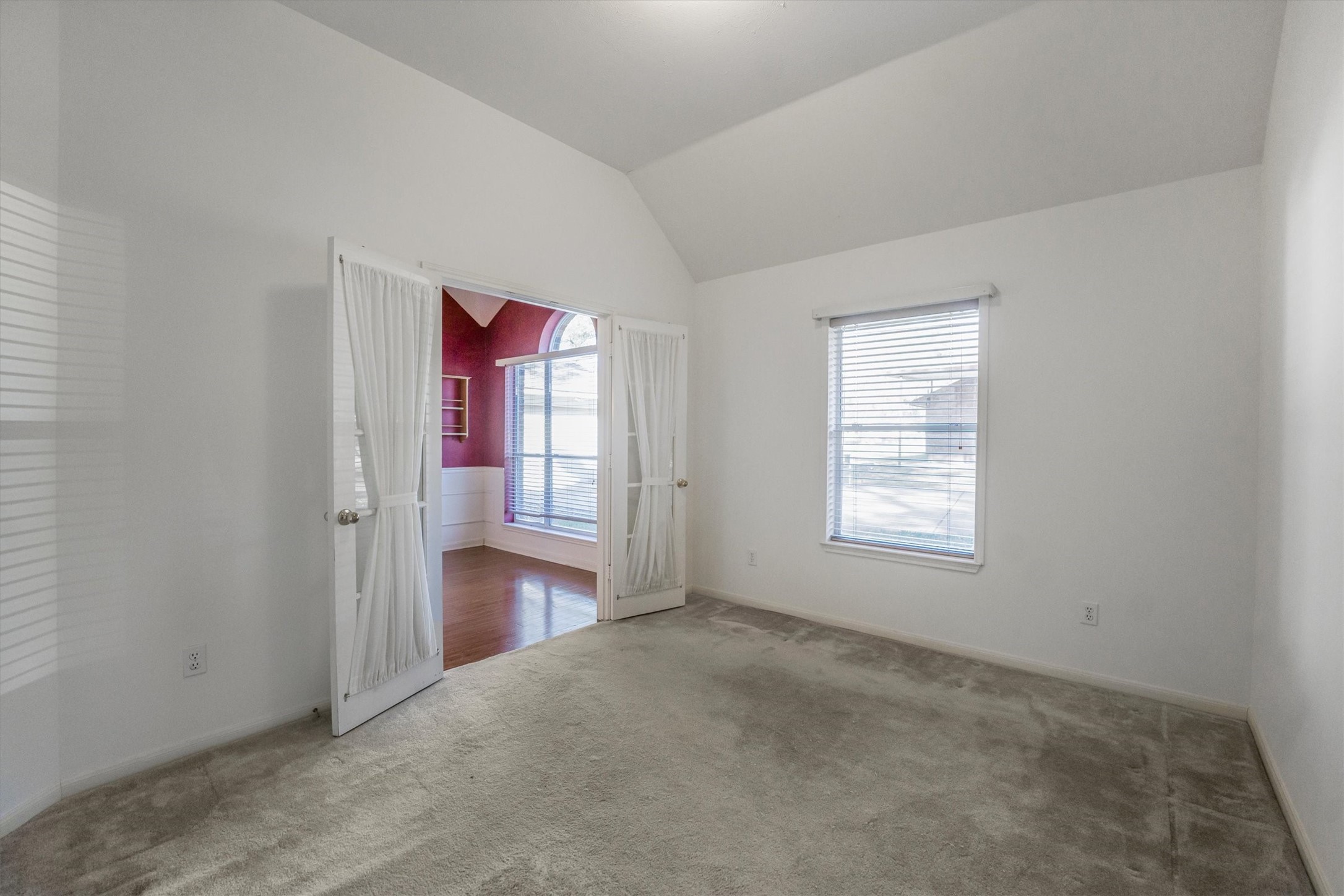 2434 Pebblebrook Circle Conroe, TX 77384 - Photo 21 of 44 an empty room with windows and closet