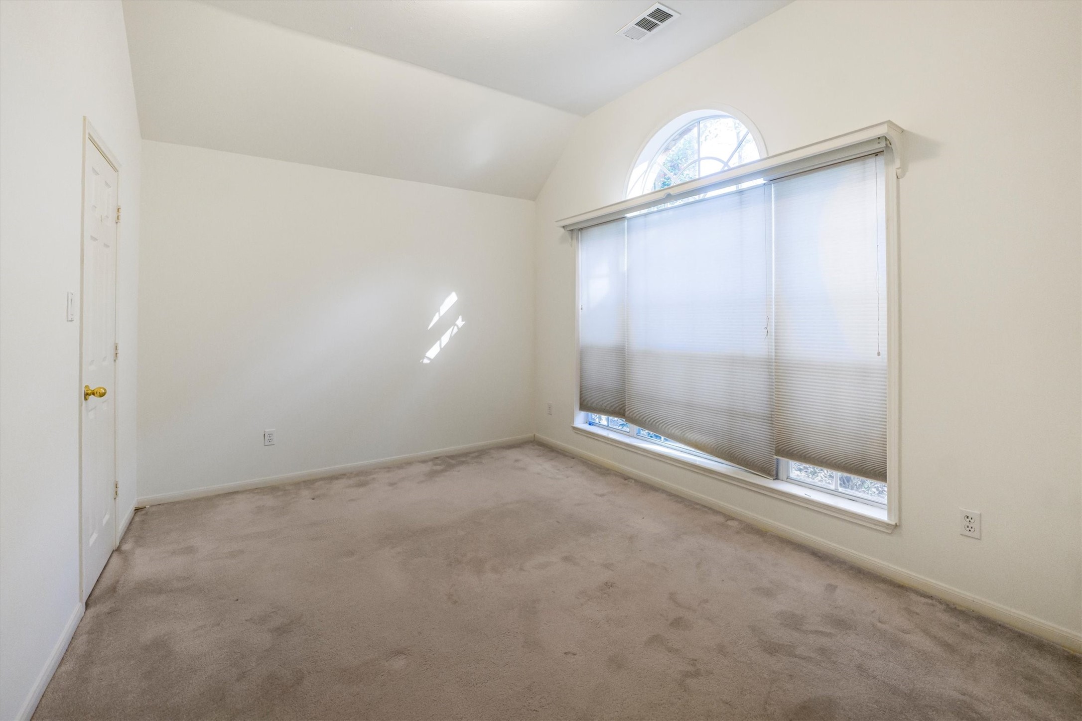 2434 Pebblebrook Circle Conroe, TX 77384 - Photo 26 of 44 a view of empty room with a large window
