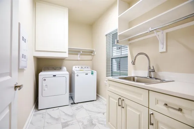 a bathroom with a sink and vanity