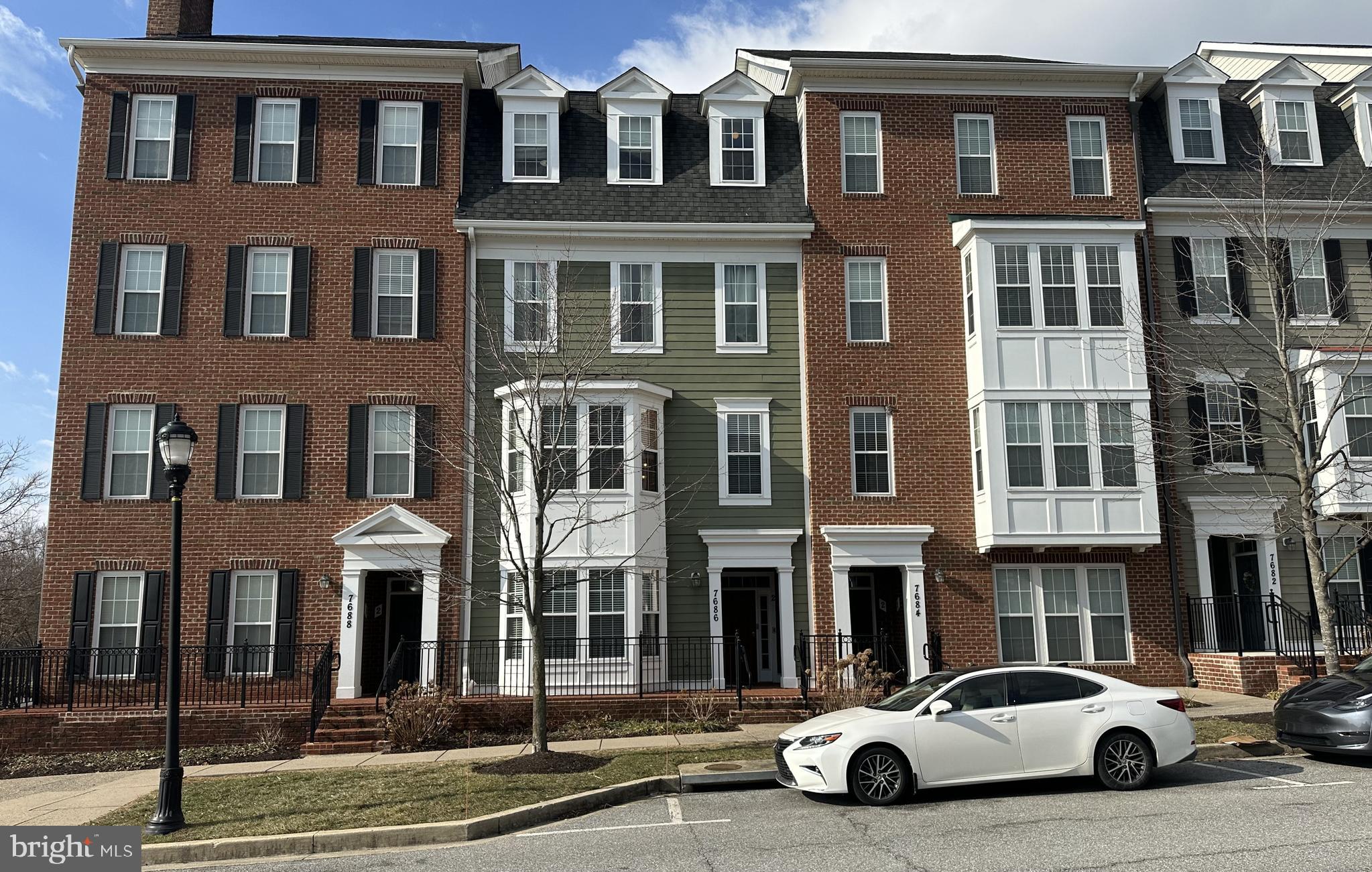 7686 Maple Lawn Boulevard, Unit 42 Fulton, MD 20759 - Photo 1 of 59 a car parked in front of a building