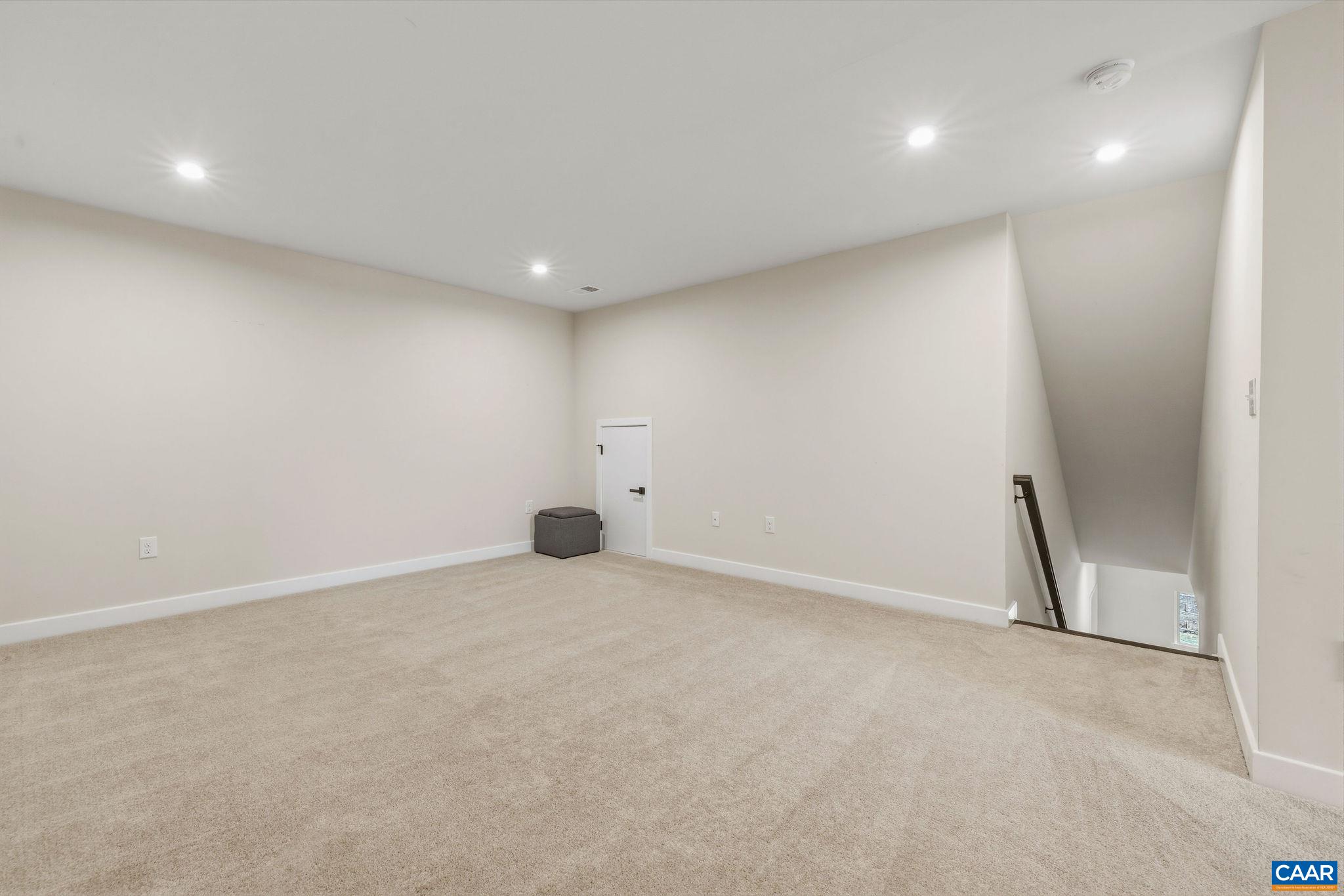 360 Winding Road Keswick, VA 22947 - Photo 35 of 48 an empty room with a natural light