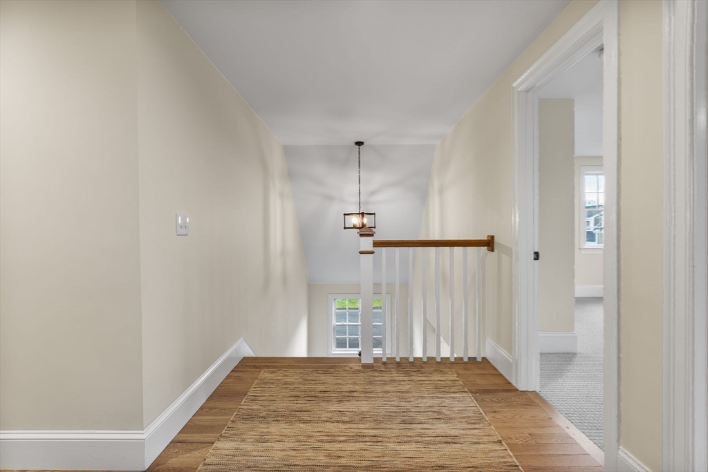 37 Lantern Lane Braintree, MA 02184 - Photo 20 of 40 a view of a bedroom with wooden floor and windows