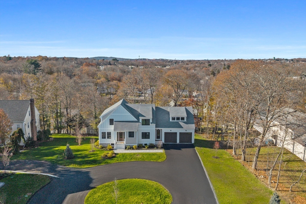 37 Lantern Lane Braintree, MA 02184 - Photo 2 of 40 an aerial view of a house with a big yard