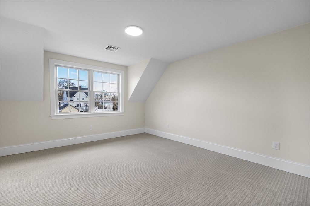 37 Lantern Lane Braintree, MA 02184 - Photo 34 of 40 an empty room with windows