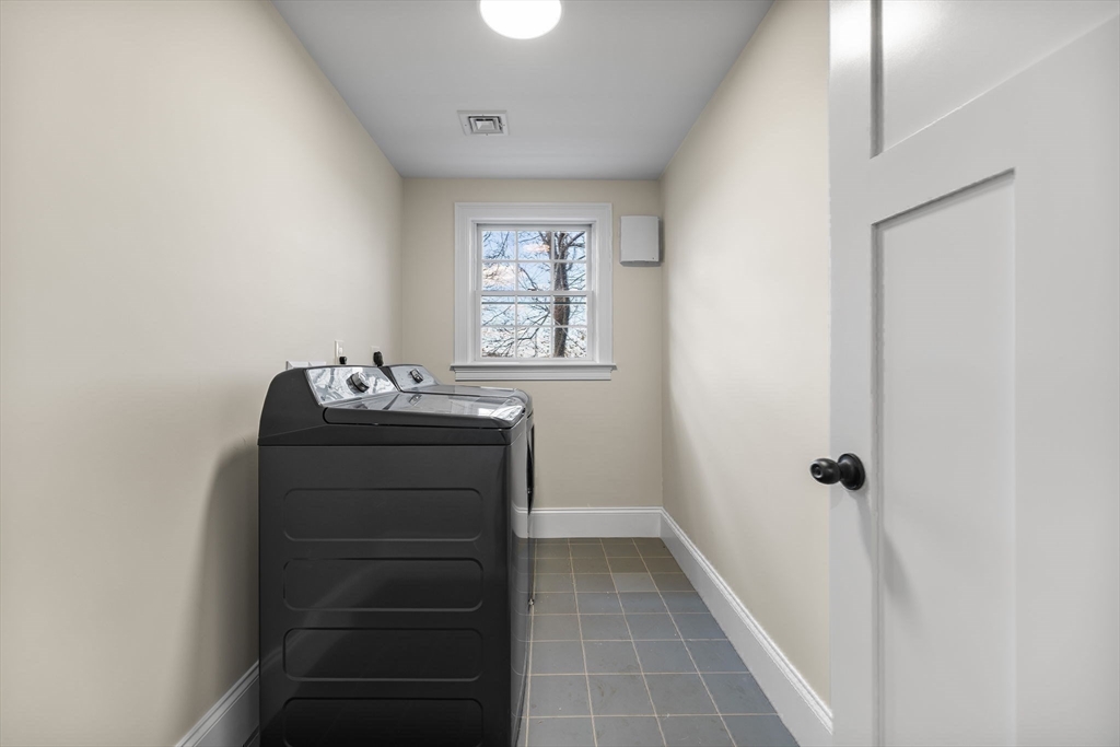 37 Lantern Lane Braintree, MA 02184 - Photo 36 of 40 a view of a hallway with closet