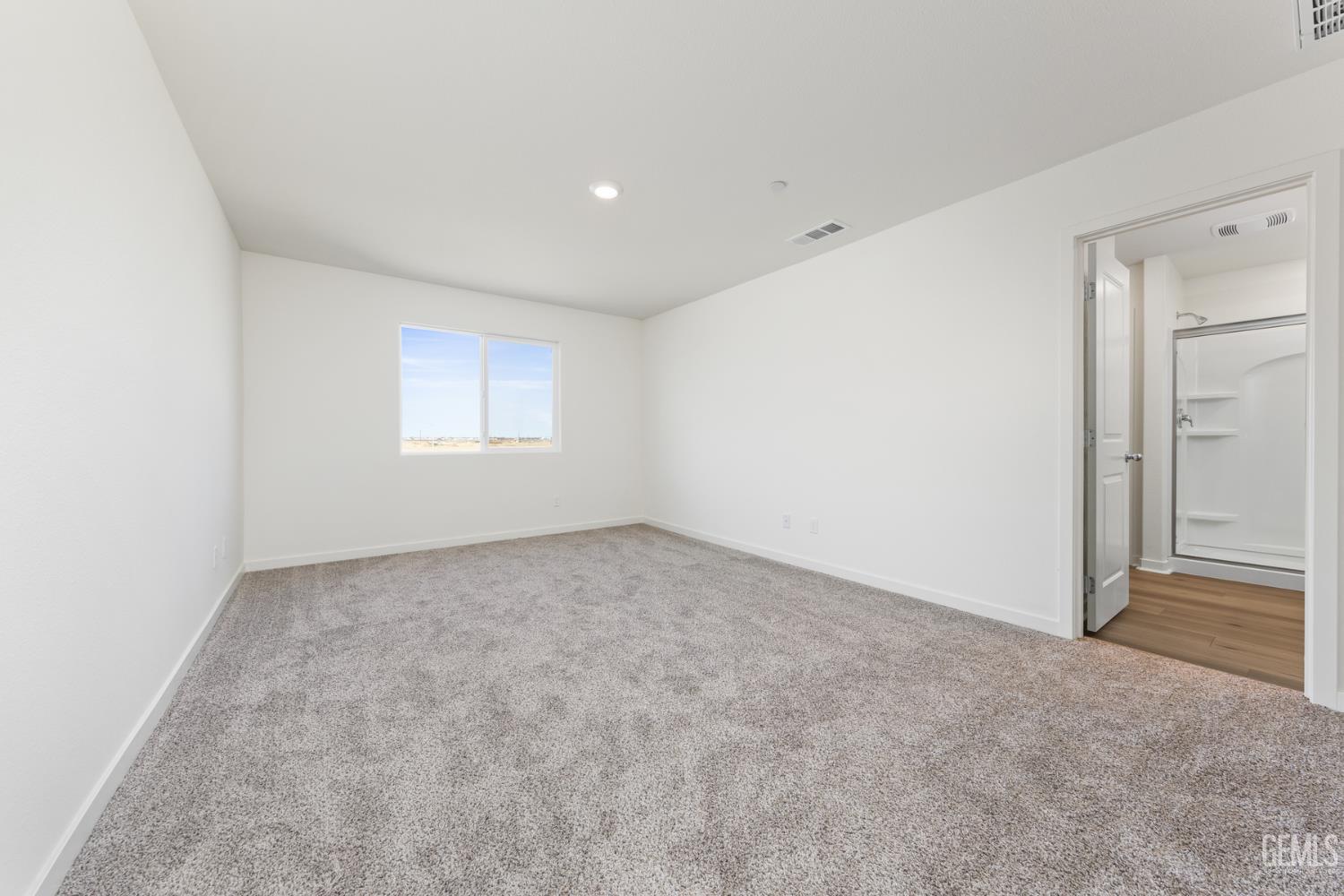 Undisclosed Address Bakersfield, CA 93313 - Photo 6 of 13 an empty room with windows