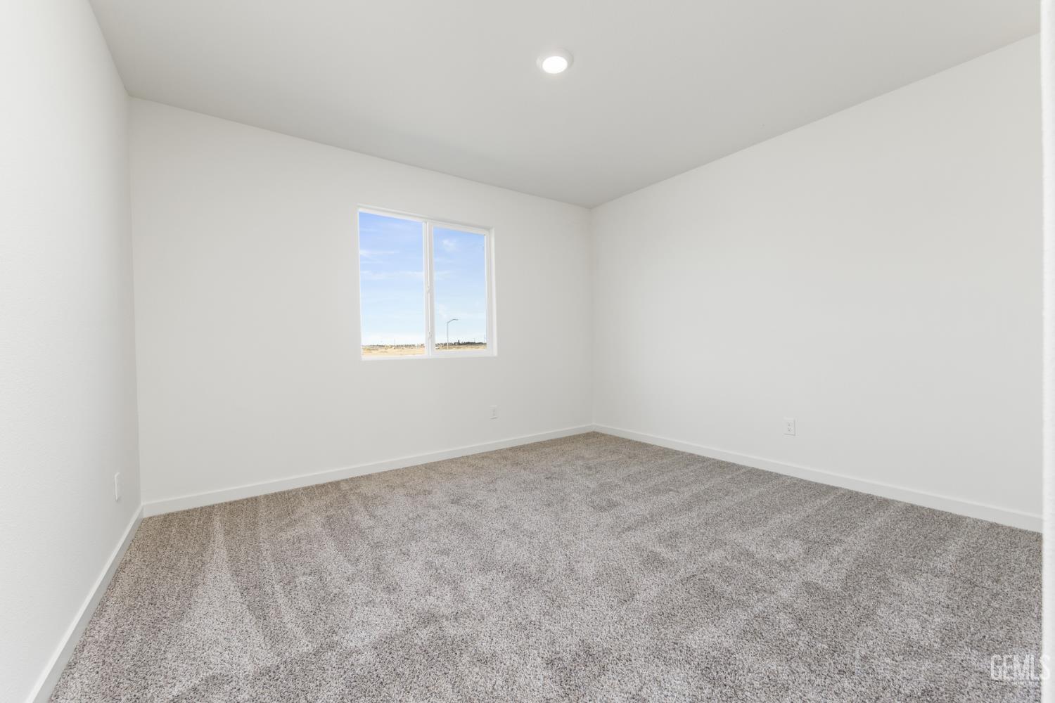 Undisclosed Address Bakersfield, CA 93313 - Photo 8 of 13 an empty room with a window