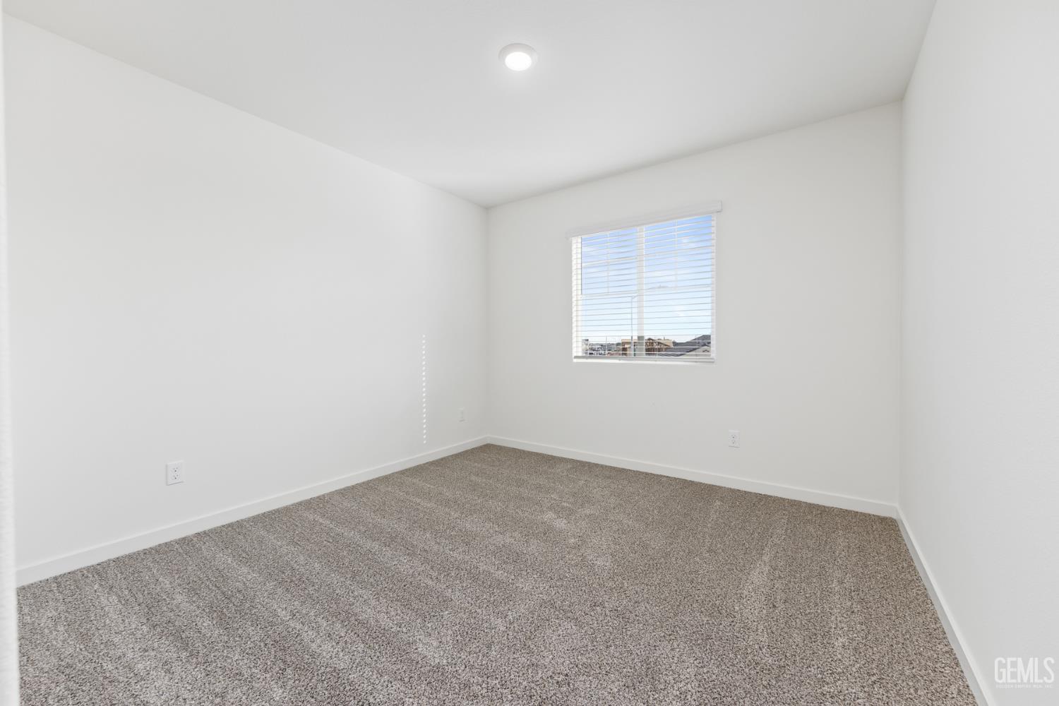 Undisclosed Address Bakersfield, CA 93313 - Photo 10 of 13 an empty room with a window