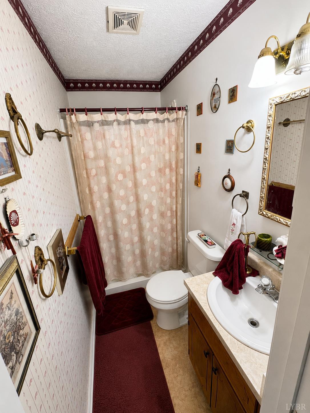 2346 Mitchell Mill Road Gladys, VA 24554 - Photo 9 of 38 a bathroom with a sink toilet and shower