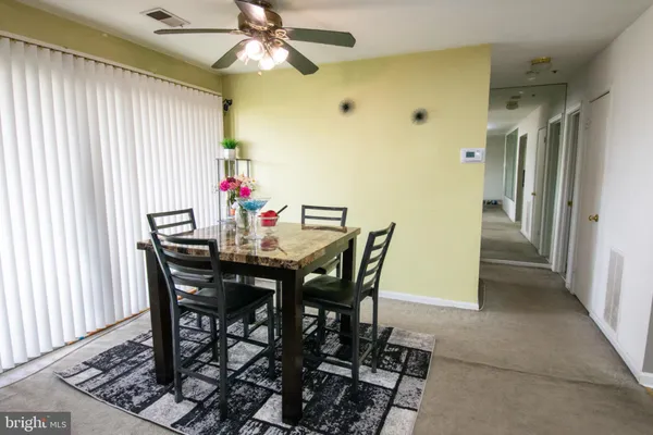 a kitchen with a sink stove and refrigerator