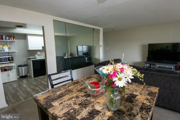 a kitchen with a stove and a refrigerator
