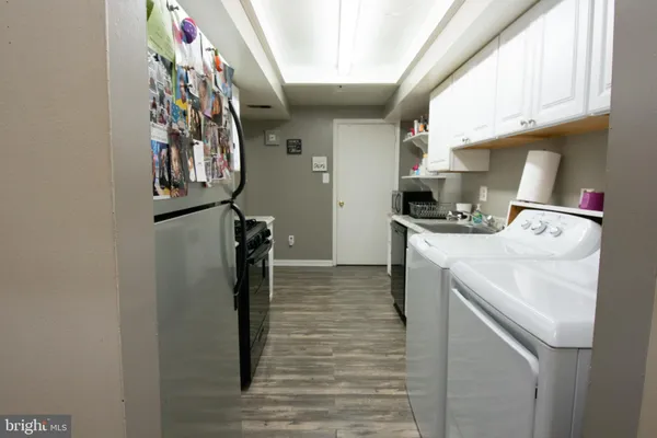 a bedroom with a bed and a mirror