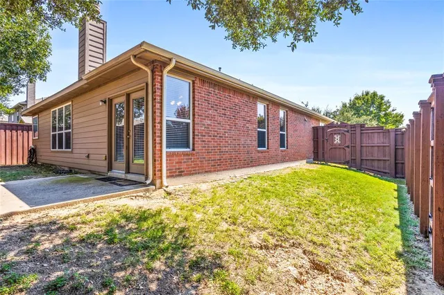 a view of a backyard with a garden