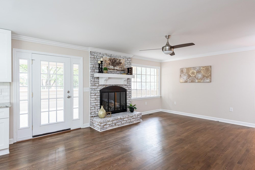 1701 Pony Run Road Raleigh, NC 27615 - Photo 10 of 30 Family Room/Breakfast Nook area with ceiling fan, gas log fireplace, and crown molding. Gorgeous hardwood floors Family Room