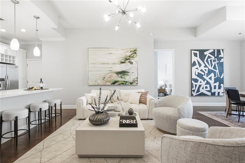 270 17th Street Northwest, Unit 4306 Atlanta, GA 30363 - Photo 11 of 37 a living room with furniture and a large window