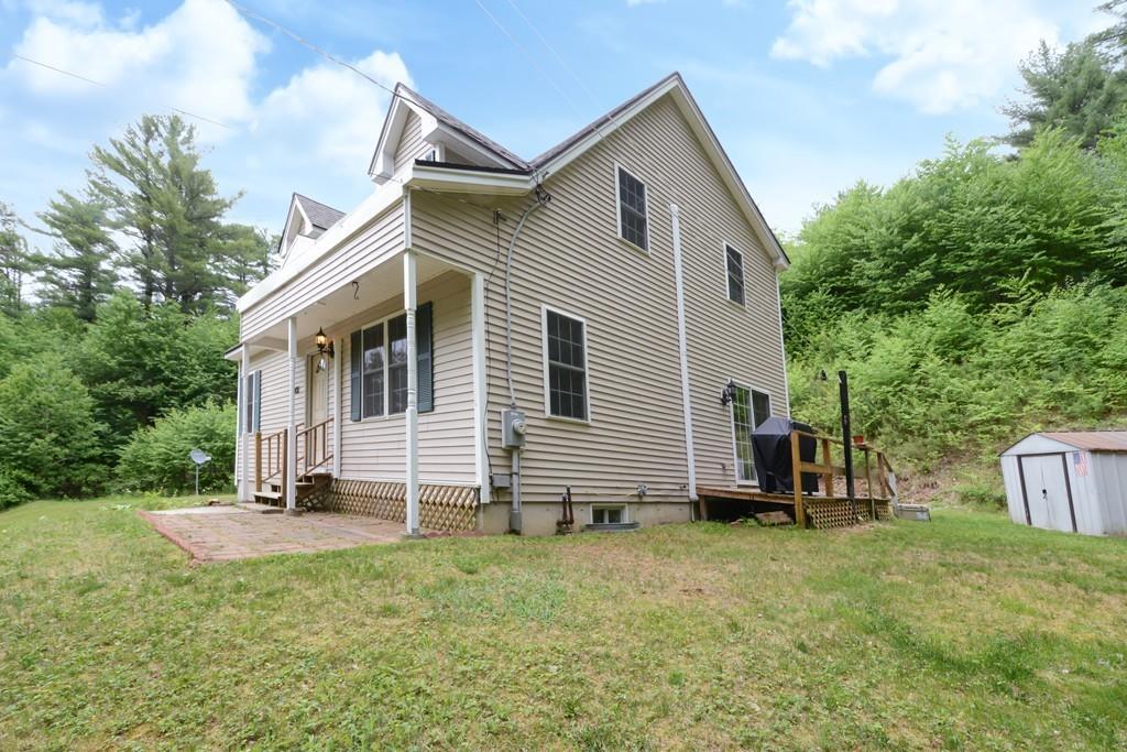 431 Barr Road New Braintree, MA 01531 - Photo 27 of 29 a view of a house with a yard