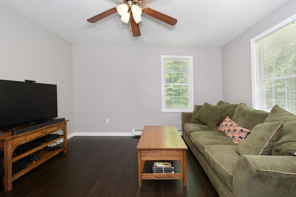 431 Barr Road New Braintree, MA 01531 - Photo 10 of 29 a living room with furniture and a flat screen tv