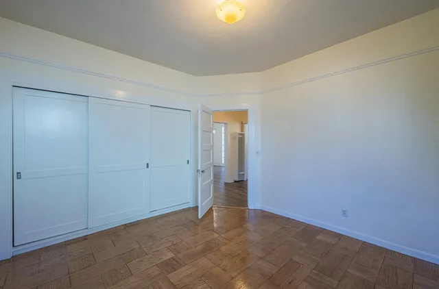 a view of an empty room and window